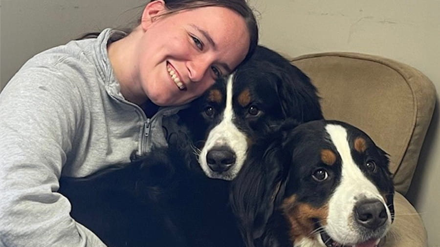 VCA Centreville veterinary staff with two dogs